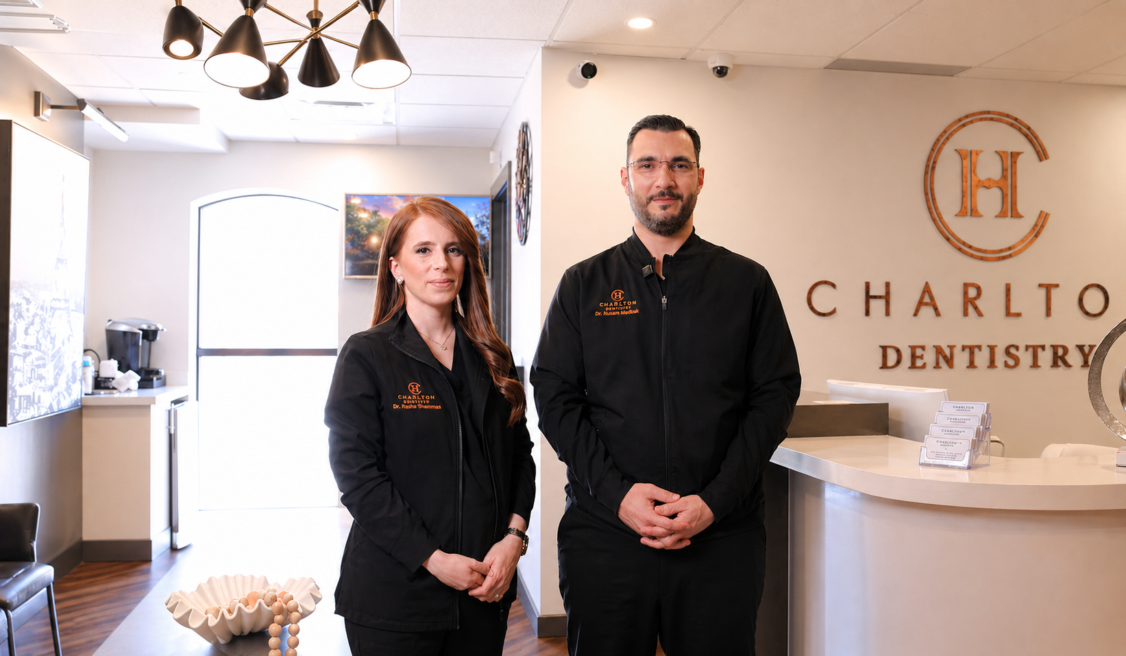 Dr. Husam Medouk and Dr. Rasha Shammas at Charlton Dentistry reception