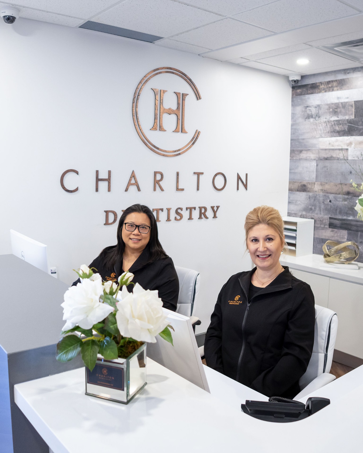Reception team welcoming a patient