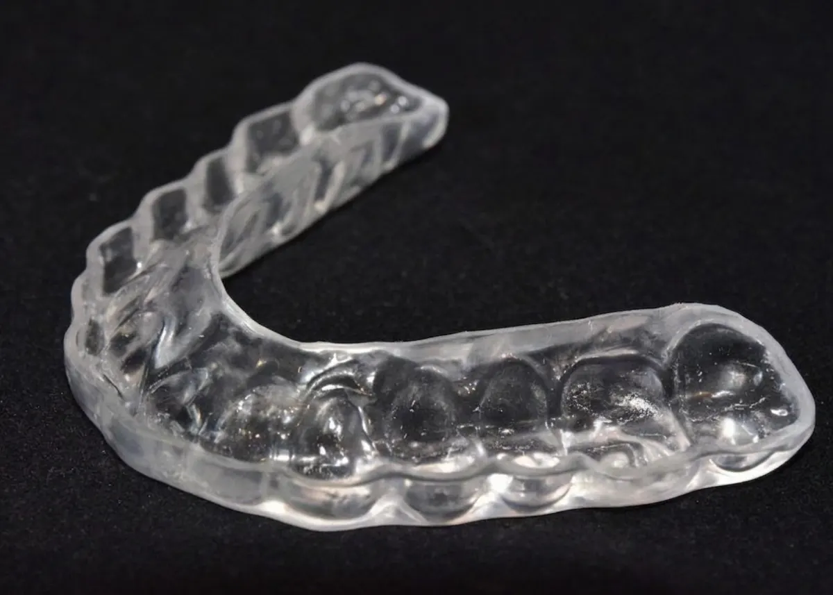 TMJ / TMD Treatment in Hamilton, ON, Custom Bite Splint (Occlusal Orthotic) | Charlton Dentistry TMJ / TMD Treatment Hamilton, custom-fabricated clear bite splint orthotic used in non-surgical TMJ therapy at Charlton Dentistry
